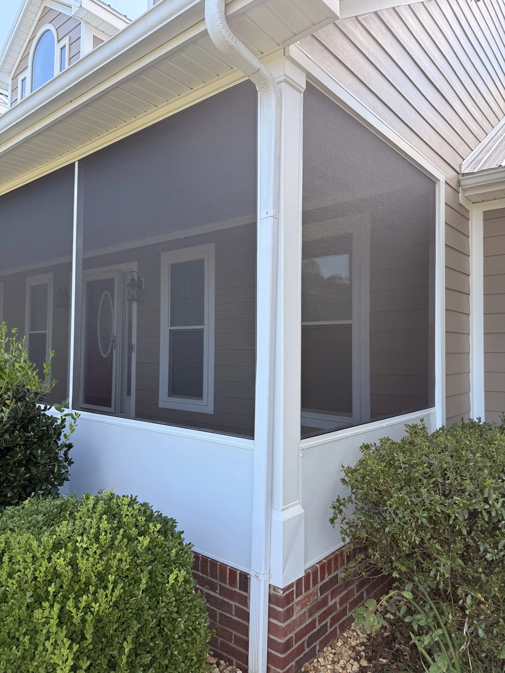 Completed screen enclosure with white lower panels at a Shorehome Kentucky project